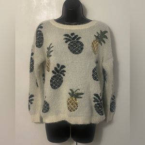 Pineapples print cozy sweater.